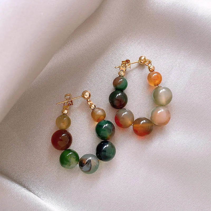 Elegant earrings with multiColoured stones